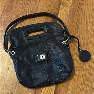Versatile Kipling Black Leather Bag